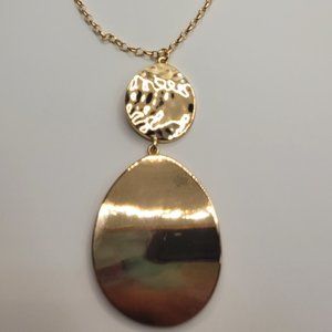 Necklace- Gold colored chain with egg shaped emblems
